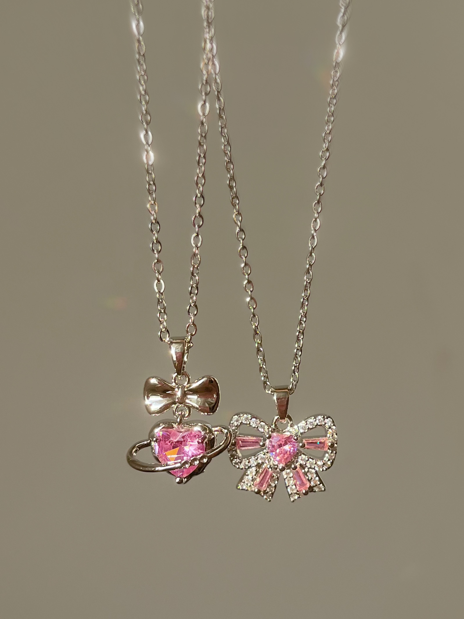 گردنبند قلب و پاپیون صورتی